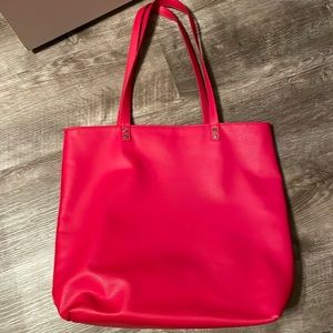 Red pebble leather tote with cute dotted inside
